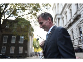 Jeremy Hunt, UK chancellor of the exchequer, arrives for a Cabinet meeting in Downing Street in London, UK, on Wednesday, Oct. 26, 2022. UK Prime Minister Rishi Sunak may delay an economic plan scheduled for Oct. 31 to give him time to square it with his agenda, Foreign Secretary James Cleverly said.