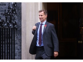 Jeremy Hunt, UK chancellor of the exchequer, departs following a weekly meeting of Cabinet ministers at 10 Downing Street in London, UK, on Tuesday, Nov. 1, 2022. Rishi Sunak's government said it's inevitable that all Britons, especially the richest, will have to pay more tax to restore stability to the public finances.