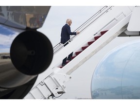 US President Joe Biden boards Air Force One at Joint Base Andrews, Maryland, US, on Tuesday, Nov. 1, 2022.  Photographer: Chris Kleponis/CNP/Bloomberg