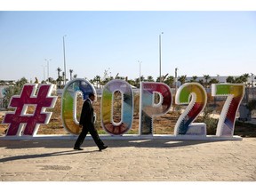 A COP27 logo sign in the grounds of the Sharm El-Sheikh International Convention Centre in Egypt.