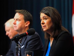 Alberta Premier Danielle Smith, Health Minister Jason Copping and Dr. John Cowell announce steps in the Alberta Health Services reform plan on Nov. 17.