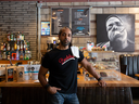 Amir Rahim in the former location of his Ottawa coffeehouse, Grounded Kitchen and Coffee Bar. Faced with relocating, Rahim decided it was time to automate as many parts of his new restaurant-cafe as he could — especially as a labour shortage made it difficult to hire staff. His new restaurant opens in December.