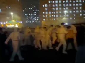 A screen shot from video shot of the violent protest at the Foxconn Technology Group plant.