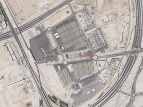 This satellite photo from Planet Labs PBC shows the Fan Village in Doha, Qatar, Oct. 16, 2022. Qatar on Wednesday, Nov. 9, 2022, unveiled a 6,000-cabin fan village in an isolated lot near its airports, an offering for housing toward the lower end of what's available for the upcoming World Cup just days away from starting.