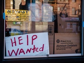 A "Help Wanted" sign outside a restaurant in the East Flatbush neighbourhood in the Brooklyn borough of New York.