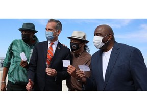 Los Angeles Mayor Eric Garcetti with Earvin "Magic" Johnson, along with Arsenio Hall and Danny Trejo. Johnson has come on board as Global LA's celebrity ambassador.