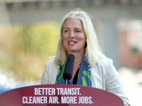 Then Minister of Infrastructure and Communities Catherine McKenna talks about the recent transit announcement during a press conference at Surrey City Hall in Surrey, B.C., on Friday, July 9, 2021. Former environment minister McKenna is calling out weak net-zero commitments and the need for governments to regulate climate pledges in her role as head of a UN climate group.