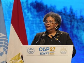 FILE - Mia Mottley, prime minister of Barbados, speaks at the COP27 U.N. Climate Summit, Nov. 8, 2022, in Sharm el-Sheikh, Egypt. The Barbados plan, dubbed the Bridgetown Initiative, could be a pathway to unlocking large sums of money from rich countries, which have contributed most to greenhouse gas emissions. Mottley first unveiled her idea at the COP26 meeting a year ago in Glasgow, Scotland, where she delivered a powerful speech and sketched out a rough plan to come up with new and innovative forms of climate finance.