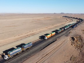 Trucks loaded with coal waiting near a port on the China-Mongolia border.