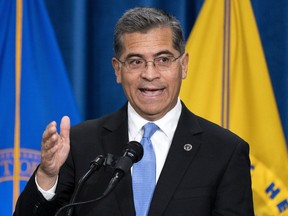 FILE - Health and Human Services Secretary Xavier Becerra speaks during a news conference at the HHS Humphrey Building, Oct. 18, 2022, in Washington. The Biden administration says it's seeing a big uptick in the number of new customers buying private health insurance for 2023 from the Affordable Care Act's marketplace.
