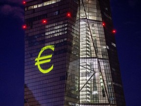 FILE - A light installation is projected onto the building of the European Central Bank during a rehearsal in Frankfurt, Germany, Dec. 30, 2021. Inflation hit a new record in the 19 countries that use the euro currency, fueled by out-of-control prices for natural gas and electricity due to the war in Ukraine, the European Union statistics agency Eurostat reported Monday, Oct. 31, 2022.