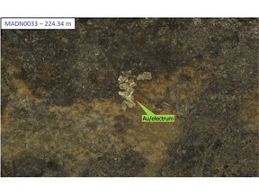 Visible Electrum (Gold/Silver Alloy) highlighted in new report. Part of 2.35 m interval in drillhole MADN0033 from 222.28 m downhole that graded 39.57 g/t Au and 0.28% Cu (see American Pacific press release on January 12, 2022).