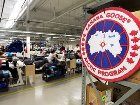 Employees make jackets at the Canada Goose factory in Toronto on April 2, 2015.