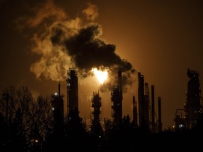 A flare stack lights the sky from the Imperial Oil refinery in Edmonton.