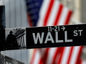 A sign for Wall Street outside the New York Stock Exchange in Manhattan.