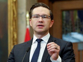 Conservative Party leader Pierre Poilievre speaks to news media outside the House of Commons on Parliament Hill in Ottawa.