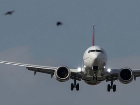 A plane landing at Toronto Pearson International Airport’s Terminal 1.