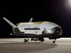 The Boeing-built X-37B Orbital Test Vehicle (OTV) is shown at NASA's Kennedy Space Center in Florida on Saturday, Nov. 12, 2022. The unmanned U.S. military space plane landed early Saturday after spending a record 908 days in orbit for its sixth mission and conducting science experiments. The solar-powered vehicle, which looks like a miniature space shuttle, landed at NASA's Kennedy Space Center. Its previous mission lasted 780 days.  (Boeing /U.S. Space Force via AP)