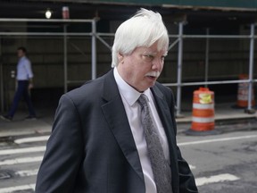 FILE - Trump Organization senior vice president and controller Jeffrey McConney returns to the courthouse after a break in the company's trial on Nov. 1, 2022, in New York. On Thursday, Nov. 10, 2022, McConney admitted , to breaking the law to help fellow Trump Organization executives avoid taxes on company-paid apartments and other perks, including by preparing misleading tax returns and failing to report the benefits to tax authorities.