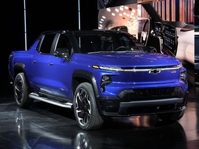 FILE - The 2024 Chevrolet Silverado EV RST is shown in Detroit, Wednesday, Jan. 5, 2022. General Motors expects its portfolio of electric vehicles to turn a profit in North America by 2025. That will come as it boosts battery and assembly plant capacity to build over 1 million EVs per year.