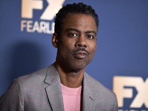 FILE - Chris Rock appears at the Television Critics Association Winter press tour in Pasadena, Calif., on Jan. 9, 2020. Netflix said Thursday that Rock will be the first artist to perform on the company's first-ever live, global streaming event.