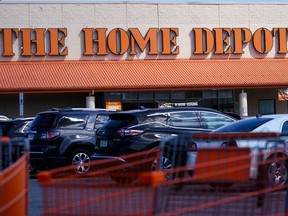 FILE - Shopping carts are parked outside a Home Depot in Philadelphia, Wednesday, Sept. 21, 2022.