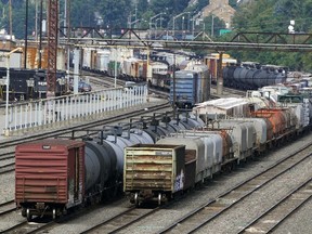 FILE - Freight cars wait to be hauled out of the Norfolk Southern Conway Terminal in Conway, Pa., Sept. 15, 2022. The possibility of an economically devastating railroad strike has been pushed back into early December to allow time for engineers and conductors to vote on their agreements with the freight railroads and give more opportunity for the industry to renegotiate with two unions that rejected their deals last month.