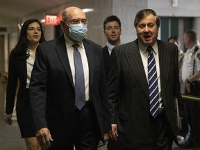 Trump Organization's former Chief Financial Officer Allen Weisselberg, left, arrives to the courtroom in New York, Thursday, Nov. 17, 2022.