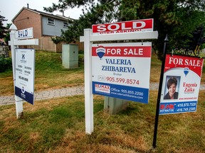 Real estate signs in Mississauga, Ont.