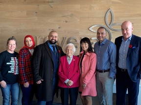 (left to right) Dr. Rhonda Collins, Chief Medical Officer, Revera; Zaynab Esayed, Pharmacy Technician, Shoppers Drug Mart (SDM); Moe Salama, Pharmacist, SDM; Hazel McCallion, Chief Elder Officer, Revera; Anne Lee, SDM Pharmacy Operations; Mohamed Elsabakhawi, Associate/Pharmacist Owner; and Tom Wellner, CEO, Revera, pose for a photo after the successful flu shot clinic at Revera's Support Office in Mississauga.