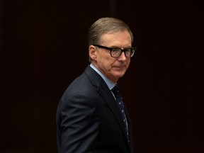 Bank of Canada governor Tiff Macklem waits to appear before the House of Commons finance committee on Nov. 23.