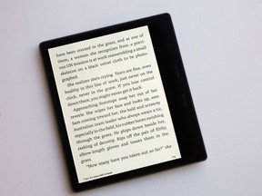 The Kindle Oasis e-reader is displayed in New York, Tuesday, Oct. 31, 2017. Amazon is now offering Kindle Unlimited (KU), a subscription service that offers readers access to hundreds of thousands of ebooks for $10 per month.