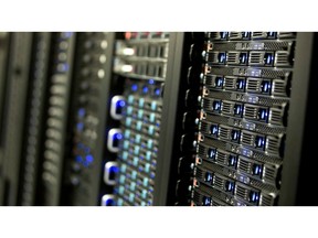 Servers stand in a computer room at the Yahoo! Inc. Lockport Data Center in Lockport, New York, U.S., on Friday, Sept. 26, 2014. Yahoo Inc., a $40 billion Web portal, is expected to release third quarter earnings on Oct. 21. Photographer: Andrew Harrer/Bloomberg via Getty Images