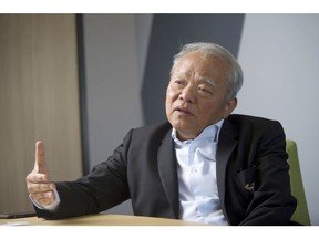 Billionaire Sathien Setthasit, chairman of Carabao Group Pcl, poses for a photograph after an interview in Bangkok, Thailand, on Wednesday, Nov. 29, 2017. Sathien plans to pour $300 million into helping his energy-drink company Carabao take on Red Bull in China. A recent slide in the firm's shares signals investors see a tough fight ahead.