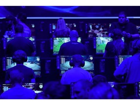 Attendees play online video game Final Fantasy XIV, published by Square Enix Holdings Co. Ltd., at the Gamescom gaming industry event in Cologne, Germany, on Tuesday, Aug. 20, 2019. Gamescom is the world's largest gaming convention and runs from August 20 to 24.
