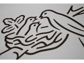 A birds nest logo is displayed during an event at the Nestle SA headquarters in Vevey, Switzerland, on Wednesday, Feb. 12, 2019. While Nestle's 2019 sales growth accelerated, analysts doubt the world's largest food company will achieve growth above 4% this year. Photographer: Stefan Wermuth/Bloomberg