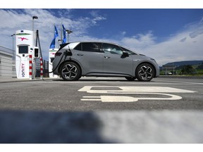 A Volkswagen AG ID.3 electric automobile charges at an Ionity GmbH charging station at motorway service area in Samerberg near Rosenheim, Germany, on Tuesday, June 29, 2021. Royal Dutch Shell Plc and Renault SA are among those interested in taking a stake in Volkswagen-backed electric vehicle charging group Ionity, Reuters reports, citing two unidentified people familiar with the matter.