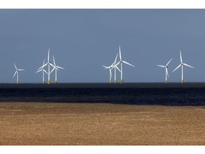 Offshore wind turbines at the Scroby Sands Wind Farm, operated by E.ON SE, near Great Yarmouth, UK, on Friday, May 13, 2022. The UK will introduce new laws for energy to enable a fast build out of renewables and nuclear power stations as set out in the government's energy security strategy last month.