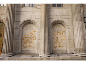 Graffiti on the facade of the Bank of England (BOE) after activists from the "Just Stop Oil" environmental coalition targeted the central bank in London, UK, on Monday, Oct. 31, 2022. The coalition of groups are pushing for the government to commit to halting new fossil fuel licensing and production.