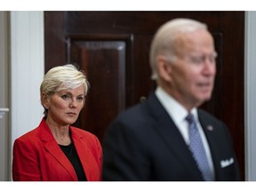 Jennifer Granholm, US energy secretary, listens as US President Joe Biden speaks in the Roosevelt Room of the White House in Washington, DC, US, on Monday, Oct 31, 2022. Biden called on Congress to consider tax penalties for oil and gas companies accruing record profits amid stubbornly high gasoline prices that are dragging on Democrats midterm prospects.