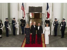 First Lady Jill Biden, from left, US President Joe Biden, Emmanuel Macron, France's president, and wife Brigitte Macron during an arrival on the North Portico of the White House ahead of a state dinner in Washington, DC, US, on Thursday, Dec. 1, 2022.  Photographer: Cliff Owen/CNP/Bloomberg
