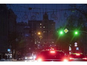 Motorists wait in traffic during a power outage in Kyiv, Ukraine, on Tuesday, Dec. 6, 2022. Ukrainians have been no strangers to hardship over the past century, but their dogged resilience and solidarity in the face of Russian bombardment has been an enduring image of a war that started at the tail end of last winter.