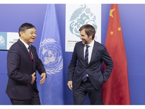 Steven Guilbeault, Canada's environment minister, right, meets with Huang Runqiu, China's ecology and environment minister, during the COP15 UN Biodiversity Conference in Montreal, on Wednesday, Dec. 14, 2022.