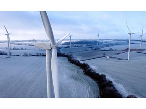 Wind turbines near Kettering, UK, on Wednesday, Dec. 14, 2022. UK power prices for Monday jumped to record levels as freezing temperatures are set to cause a surge in demand, just as a drop in wind generation causes a supply crunch.