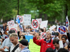 Anglophone opponents of Quebec's French-language law Bill-96 protest in downtown Montreal, in May.