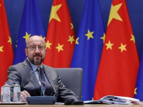 FILE - European Council President Charles Michel arrives to meet with European Union foreign policy chief Josep Borrell and via video-conference, European Commission President Ursula von der Leyen and Chinese President Xi Jinping during an EU China summit at the European Council building in Brussels, Friday, April 1, 2022. China says president and ruling Communist Party leader Xi Jinping was holding talks Thursday, Dec. 1, 2022, with visiting Michel in Beijing, amid frictions over trade, Russia and Taiwan.