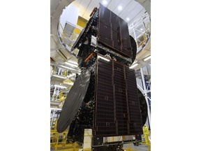 Maxar-built Galaxy 35 and Galaxy 36 for Intelsat stacked before launch. Credit: Arianespace.