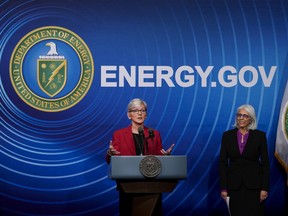 Secretary of Energy Jennifer Granholm, joined at right by Arati Prabhakar, the president's science adviser, announces a major scientific breakthrough in fusion research that was made at the Lawrence Livermore National Laboratory in California, during a news conference at the Department of Energy in Washington, Tuesday, Dec. 13, 2022.