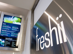 A Freshii restaurant sign