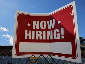 Hiring was flat in November but Canada's jobless rate edged down to 5.1 per cent.
